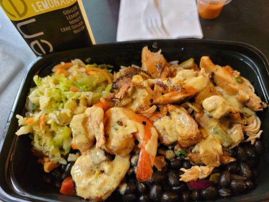 Jerk Chicken & Jerk Shrimp Combo w/ rice, beans and cabbage.  Tasted exactly how it looks:  incredible.