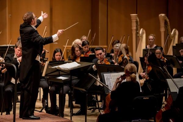 Artistic Director Scott Specks conducts the Chicago Philharmonic. Photo by Elliot Mandel.