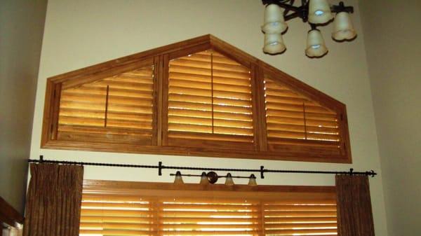 4" stained movable louvers with a rake top shutters