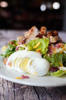 Cobb Salad -- Topped with hickory-grilled chicken. Choose a house-made dressing.