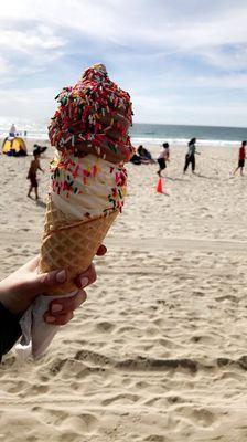 Chocolate and vanilla soft serve with rainbow sprinkles.