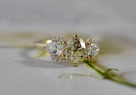 Vintage style engagement ring with old mine cut yellow diamond