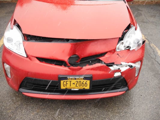 Toyota Prius Vs. back bumper of a pick up truck.