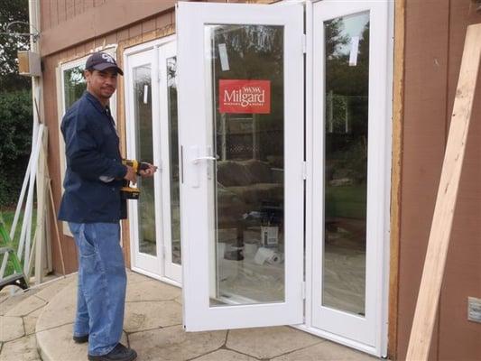 Oscar is installing a set of Milgard Ultra Fiberglass French Doors with Side Lites. Fiberglass is both durable and paintable.