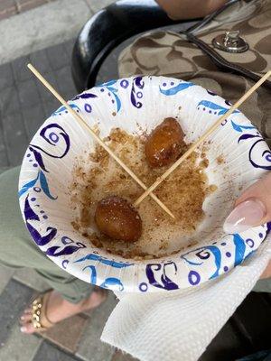 What's left over from our loukoumades (Greek street donuts) served with the original toppings of honey and walnuts.