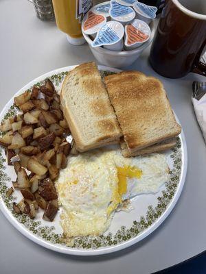 Eggs, bacon, American fries & toast..