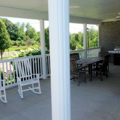 Gas grill and dining table in the pool area