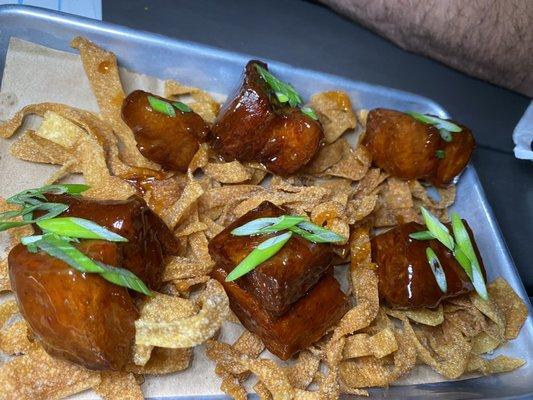 Pork belly bites with wonton chips