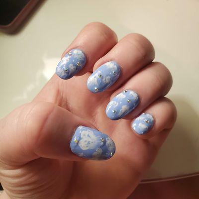 Full set acrylic nails with cloud design