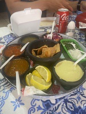 Salsas and taco fillers (cebollita picada, cilantro, pockled purple onion). I preferred the molcajete salsa.