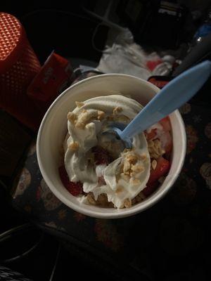 Strawberry yogurt and vanilla yogurt with strawberries and peanuts