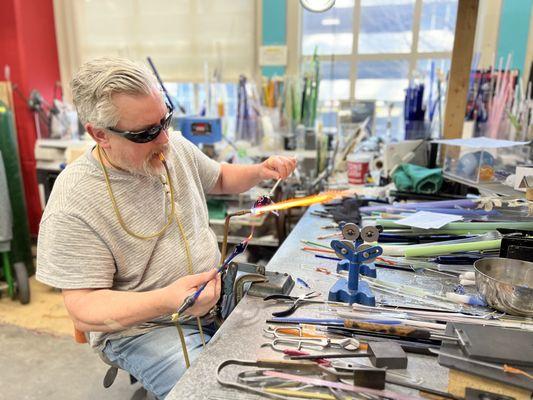 Mark Payton working at the torch.