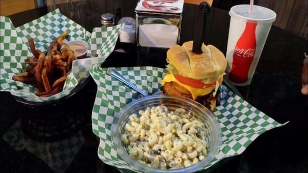 I do believe this is a Double bacon cheeseburger with a side of Mac salad AND a side of fries.