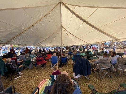 Gathered together under a tent for our Groundbreaking Service