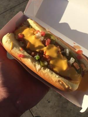 The OG big bite with mustard and onion relish pico de gallo jalapeños and chili cheese.