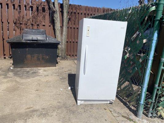 Grease trap & old refrigerator