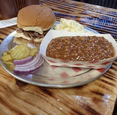 Waygu chopped beef sandwich with the famous baked beans and a homemade potato salad !!