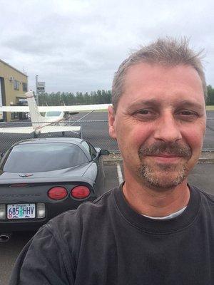 My Vette, and the plane I'm getting ready to fly.   Life is good, when you work hard for what you want