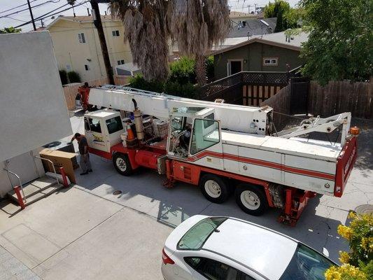 They rented a crane to get my unit on the rooftop. They had the new unit, crane and team ready in under 2 days when I gave them the go!