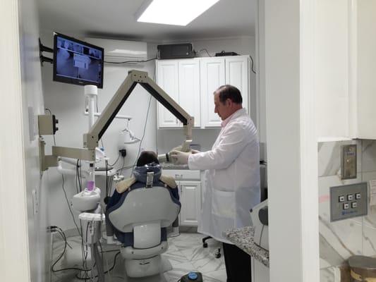 Dr. Feinstein showing a patient an X-ray