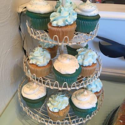 Cupcake display - blue champagne (perfection) and bananas foster (cake great, icing whipped )