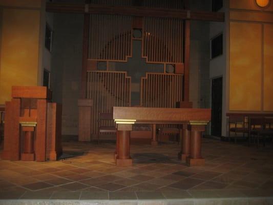 The stripped altar on Passion Week's Maundy Thursday svc.