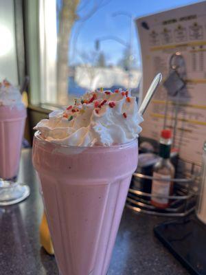 Strawberry shake split between two.