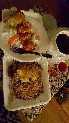 Steamed rice w/sweet n sour chicken.  Veggie egg foo young w/ a bowl of its brown sauce. Wish there were actual veggies w/ the egg patties.