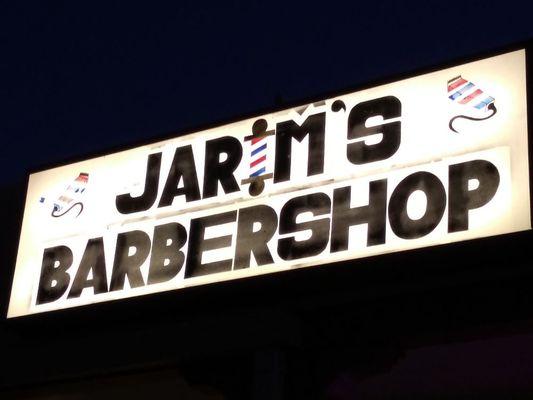 The front sign to the barbershop