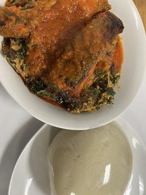 Stewed chicken and fish, over okro with fufu