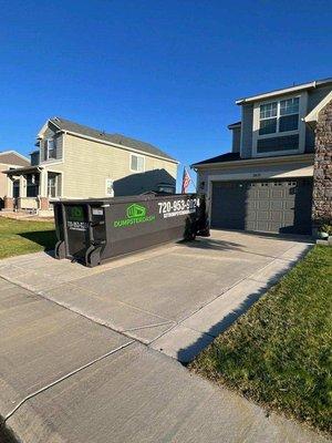 15 Yard Dumpster in driveway