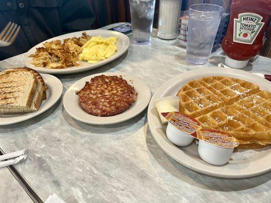 Waffle, corned beef hash, hashbrowns, rye toast