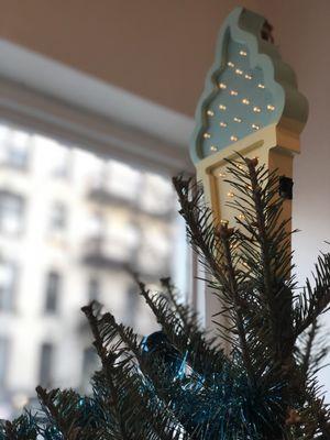 Custom Christmas tree topper, shaped like an ice cream cone.