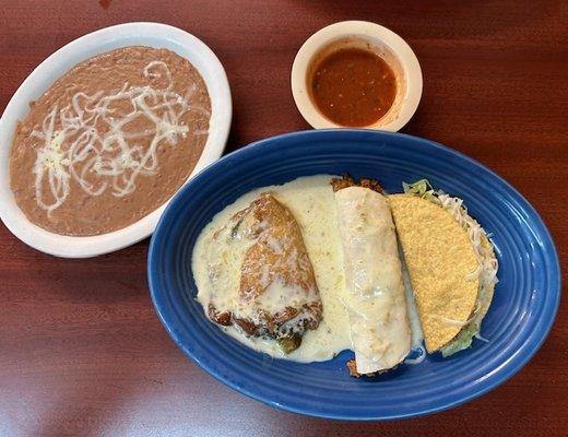 # 1 combination dinner: a beef burrito, a taco and a chili relleno, side of beans.