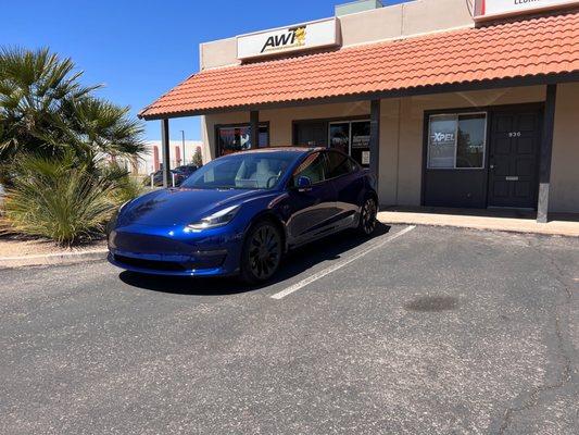 Tesla with tint and paint protection film