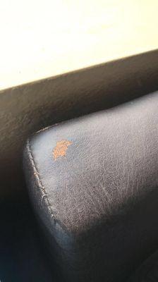 Damaged leather couch