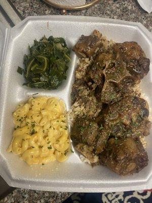 Mawmaw's Oxtails Rice and Gravy with two sides.