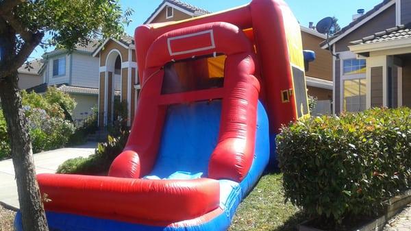 COMBO WITH WATER SLIDE..LARGE ENOUGH FOR A 10 YEAR OLD AND HIS FRIENDS TO HAVE A GREAT TIME