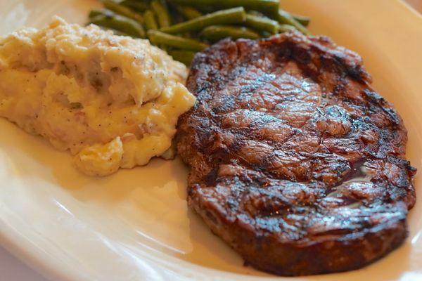 Rib eye steak decent size with mashed potato and string beans *6/8/23