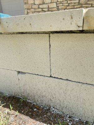 $3k for a short cinderblocks/chipped limestone wall. They put down sod on top of gravel, which immediately died.