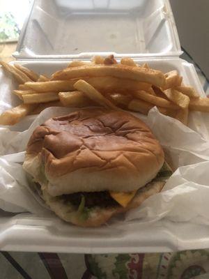 Cheeseburger that is delicious. Check out the fries!