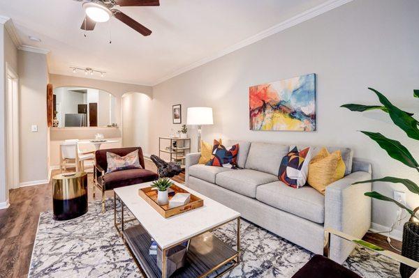 Living room with view of kitchen and dining space