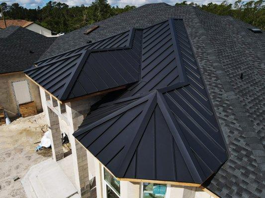 Shingles by GAF in the color Charcoal. Metal sections really made this roof stand out! Metal by Sunshine Metal