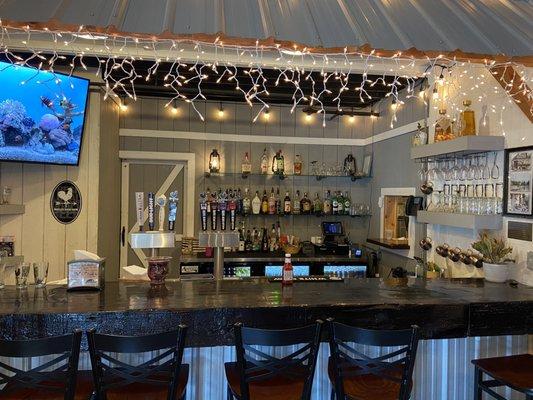 Full service bar- liquor/draft beer/bottled beer/specialty drinks/HAPPY HOUR