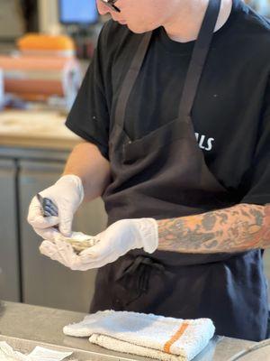 Shucking oysters for our Wednesday oyster special