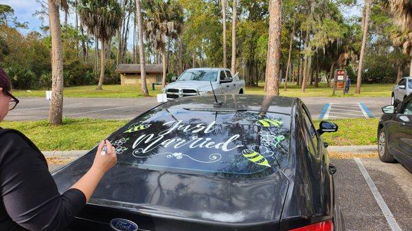 Parking for shelter #5. Just married car for scale. Look at that beautiful lettering.