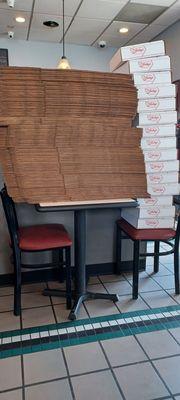 Super busy place.  Stacks of boxes for sticky buns.