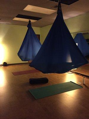 Savasana (resting pose) in aerial hammock.