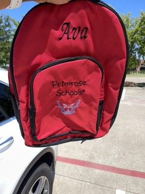 Backpack with name and butterfly added