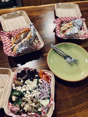 Carry out - spinach salad, roast beef, and an Italian with side of potato salad.